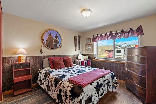 405 Lower Deep Creek Rd, Townsend, MT 59644 - bedroom with a wainscoted wall and dark wood finished floors