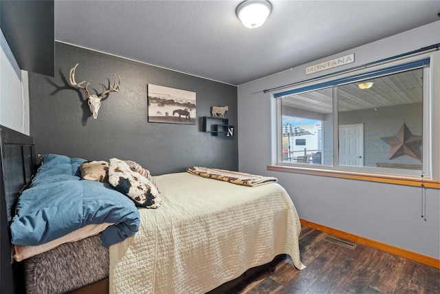 405 Lower Deep Creek Rd, Townsend, MT 59644 - bedroom with wood finished floors and baseboards