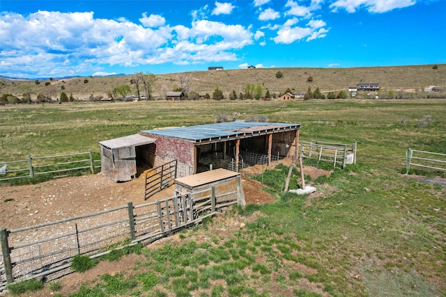 405 Lower Deep Creek Rd, Townsend, MT 59644 - view of yard featuring an exterior structure, a view of rural / pastoral area, and an outbuilding