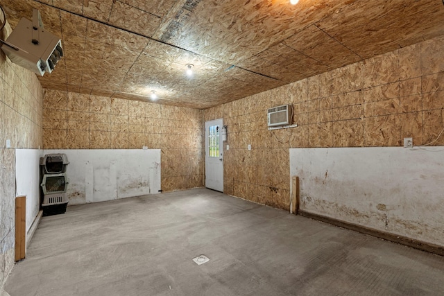 405 Lower Deep Creek Rd, Townsend, MT 59644 - spare room featuring concrete floors, a wall mounted AC, and heating unit