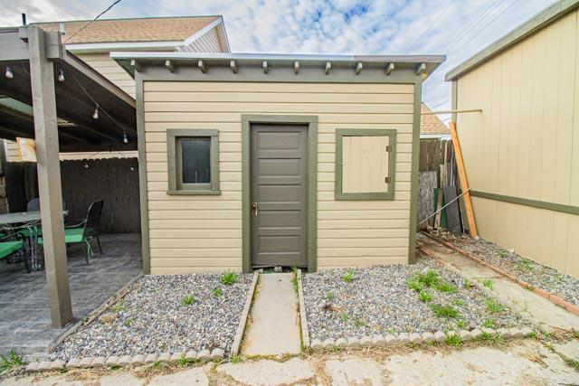 601 S Idaho St, Butte, MT 59701 - view of shed featuring fence