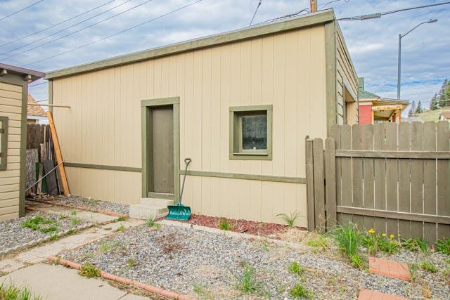 601 S Idaho St, Butte, MT 59701 - back of house with fence and entry steps