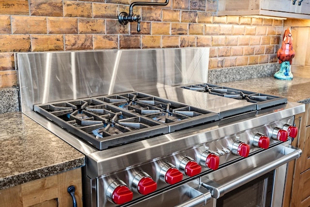 66 Elk Highlands Dr, Whitefish, MT 59937 - kitchen view of tasteful backsplash and double oven range