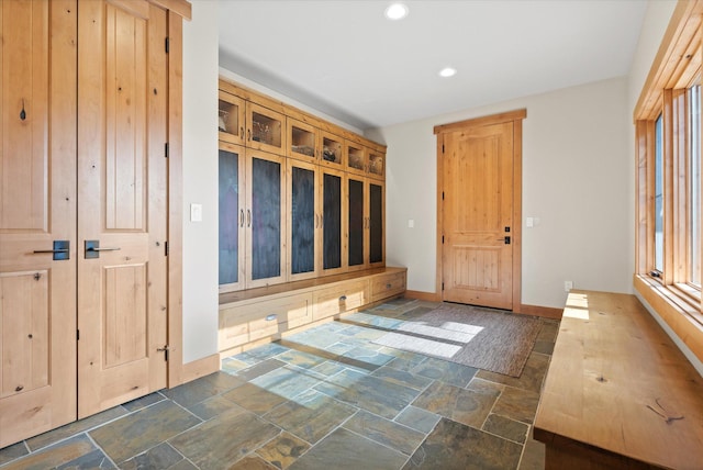 66 Elk Highlands Dr, Whitefish, MT 59937 - mudroom featuring stone tile flooring, recessed lighting, and baseboards