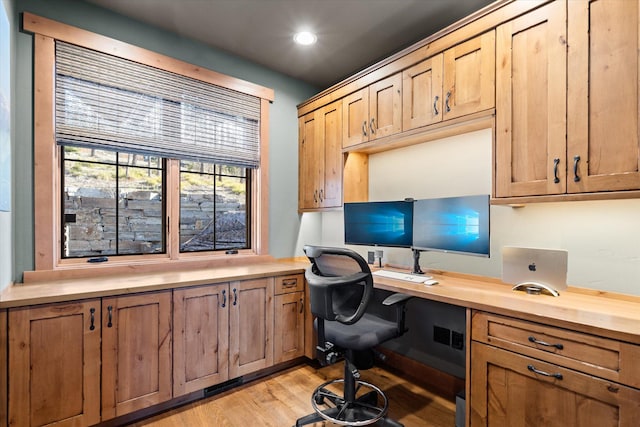 66 Elk Highlands Dr, Whitefish, MT 59937 - home office with built in study area, light wood-style floors, and recessed lighting