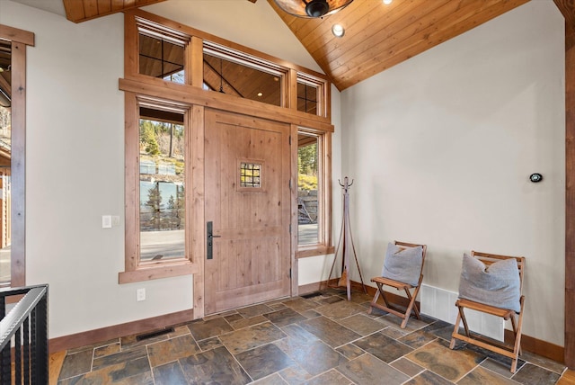 66 Elk Highlands Dr, Whitefish, MT 59937 - foyer featuring baseboards, vaulted ceiling, stone tile flooring, recessed lighting, and wooden ceiling