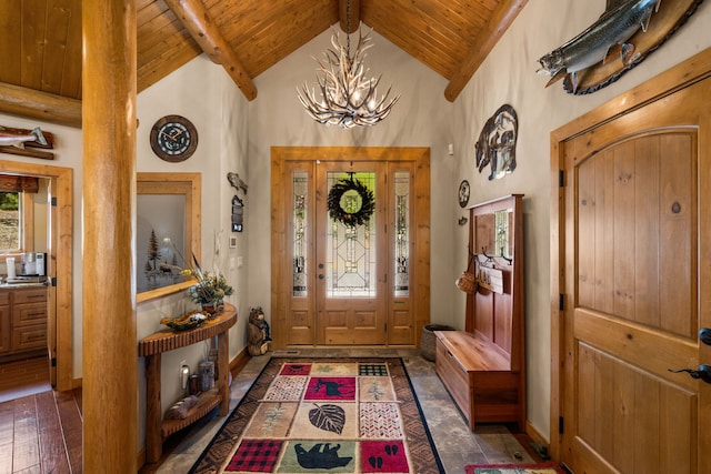 51605 Lake Mary Ronan Rd, Proctor, MT 59929 - foyer entrance with a wood ceiling with exposed beams, a chandelier, and high vaulted ceiling