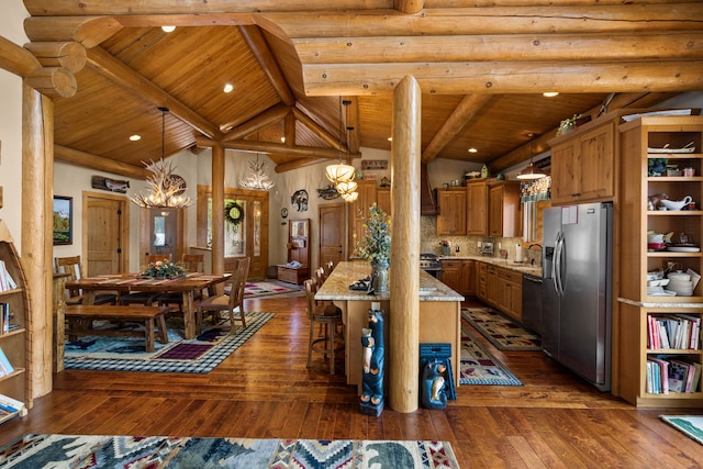 51605 Lake Mary Ronan Rd, Proctor, MT 59929 - kitchen with stainless steel fridge, a chandelier, dishwasher, dark wood-style floors, and a wooden ceiling with exposed beams