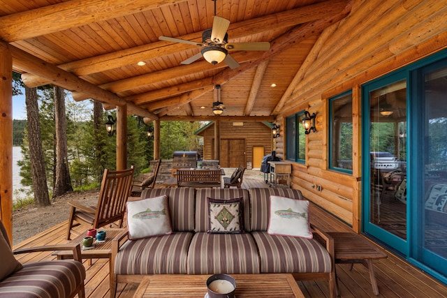 51605 Lake Mary Ronan Rd, Proctor, MT 59929 - wooden deck with a ceiling fan and grilling area