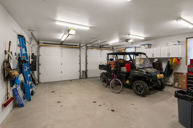 51605 Lake Mary Ronan Rd, Proctor, MT 59929 - garage featuring a garage door opener