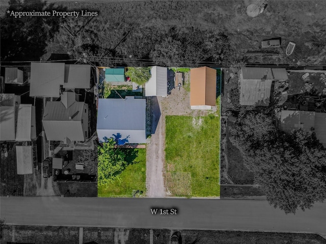514 W 1st St, Libby, MT 59923 - aerial view of property and surrounding area with property parcel outlined