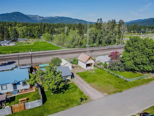 514 W 1st St, Libby, MT 59923 - aerial view of a mountain backdrop and a heavily wooded area