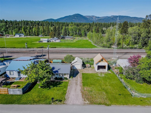 514 W 1st St, Libby, MT 59923 - view from above of property with a forest and a mountain backdrop