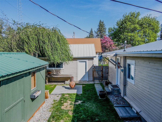 514 W 1st St, Libby, MT 59923 - view of yard featuring an outdoor structure