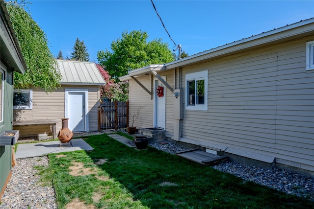 514 W 1st St, Libby, MT 59923 - view of yard with an outdoor structure and a patio