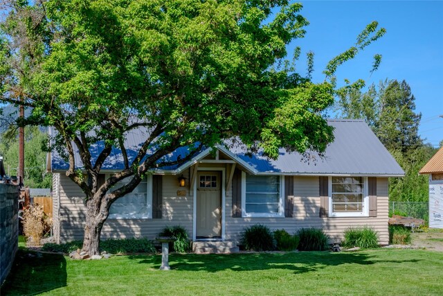 514 W 1st St, Libby, MT 59923 - view of front facade featuring metal roof