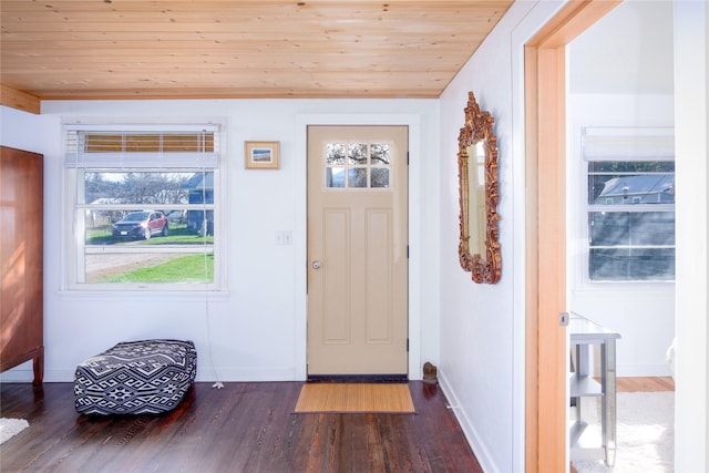 514 W 1st St, Libby, MT 59923 - entryway with dark wood-type flooring, plenty of natural light, wooden ceiling, and baseboards