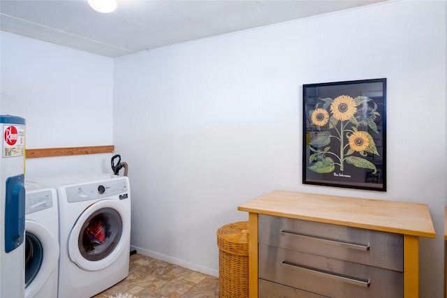 514 W 1st St, Libby, MT 59923 - washroom with separate washer and dryer, baseboards, and stone finish floors