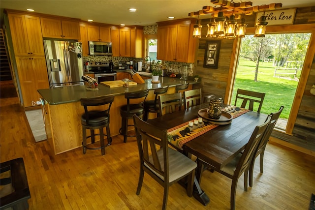 35966 Dublin Gulch Rd, Saint Ignatius, MT 59865 - dining area featuring light wood finished floors, a chandelier, and recessed lighting