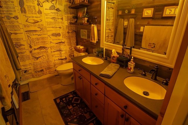 35966 Dublin Gulch Rd, Saint Ignatius, MT 59865 - bathroom with tile patterned floors, double vanity, and toilet