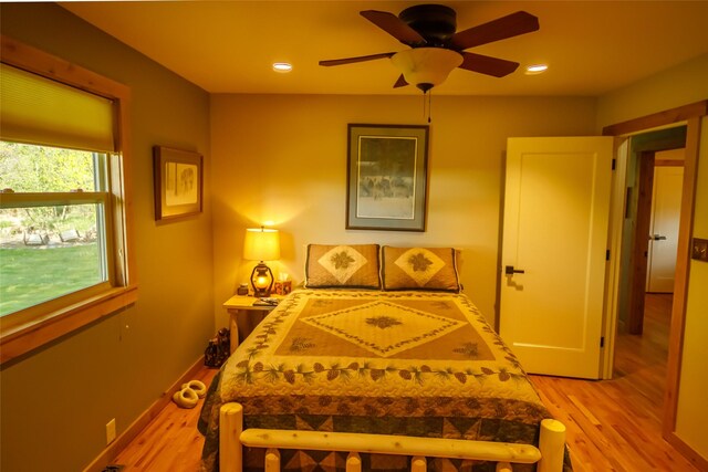 35966 Dublin Gulch Rd, Saint Ignatius, MT 59865 - bedroom with light wood finished floors, recessed lighting, ceiling fan, and baseboards