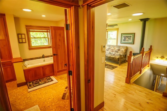 35966 Dublin Gulch Rd, Saint Ignatius, MT 59865 - hall with a sink, recessed lighting, light wood-style floors, and baseboards