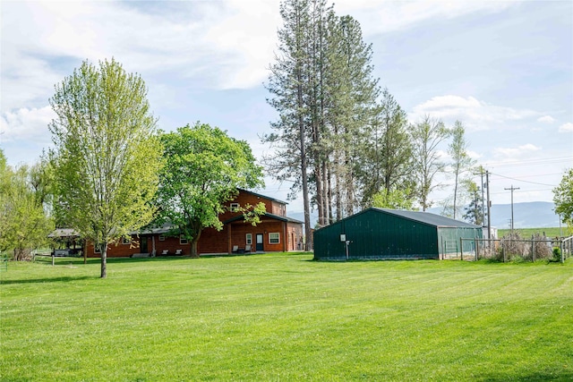 35966 Dublin Gulch Rd, Saint Ignatius, MT 59865 - view of yard featuring a pole building and an outbuilding
