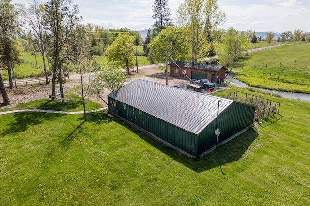 35966 Dublin Gulch Rd, Saint Ignatius, MT 59865 - view of storm shelter with an outbuilding, an outdoor structure, a yard, and a view of countryside