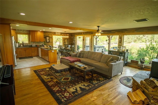 35966 Dublin Gulch Rd, Saint Ignatius, MT 59865 - living area featuring light wood finished floors, recessed lighting, a ceiling fan, and healthy amount of natural light