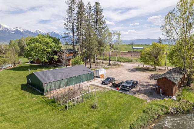 35966 Dublin Gulch Rd, Saint Ignatius, MT 59865 - aerial view of property and surrounding area featuring a mountainous background