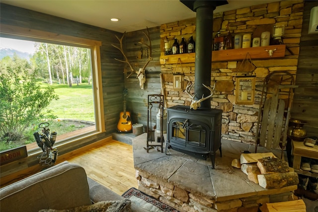 35966 Dublin Gulch Rd, Saint Ignatius, MT 59865 - detailed view of a wood stove, wood finished floors, and recessed lighting