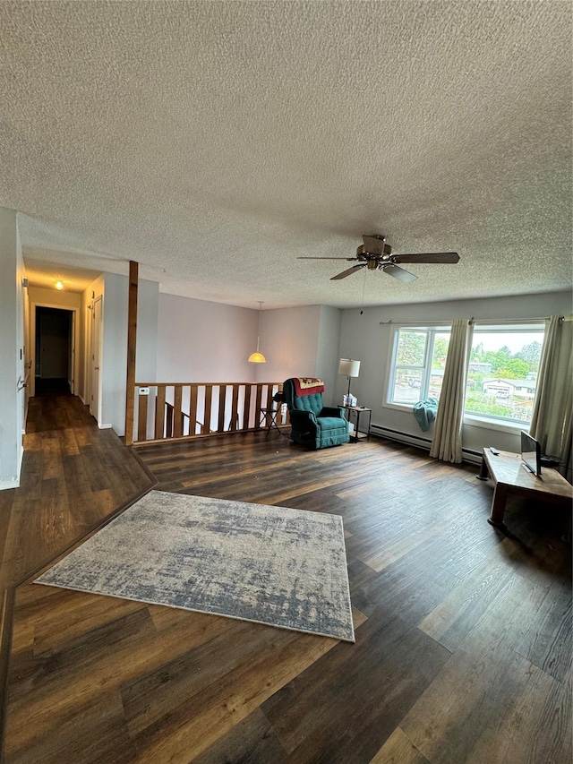 4900 Clearview Way, Missoula, MT 59803 - living room with wood finished floors, ceiling fan, and a textured ceiling