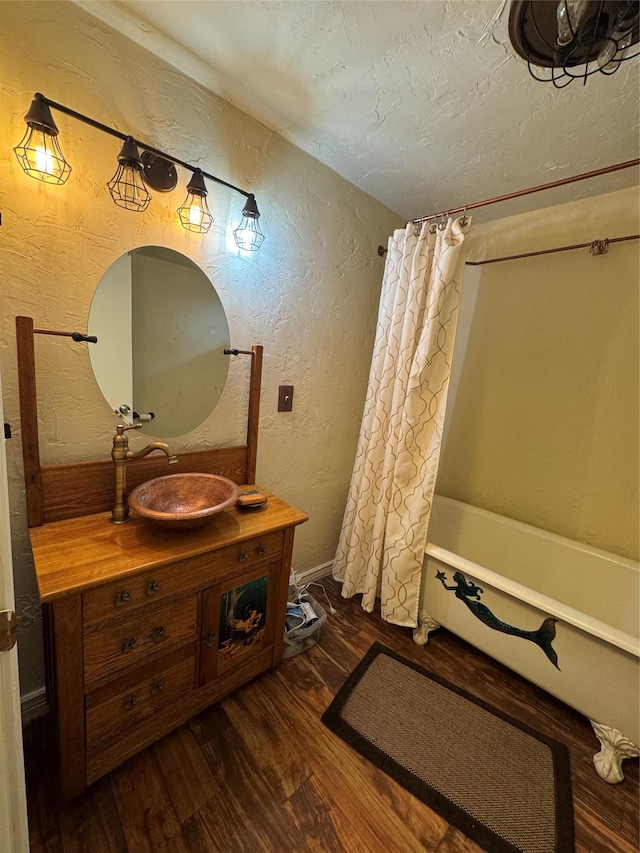 4900 Clearview Way, Missoula, MT 59803 - full bath featuring wood finished floors, a textured wall, vanity, and a textured ceiling