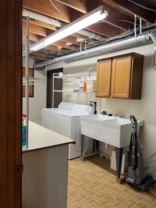 156 Clary Ave W, Geraldine, MT 59446 - laundry area featuring washing machine and clothes dryer and cabinet space