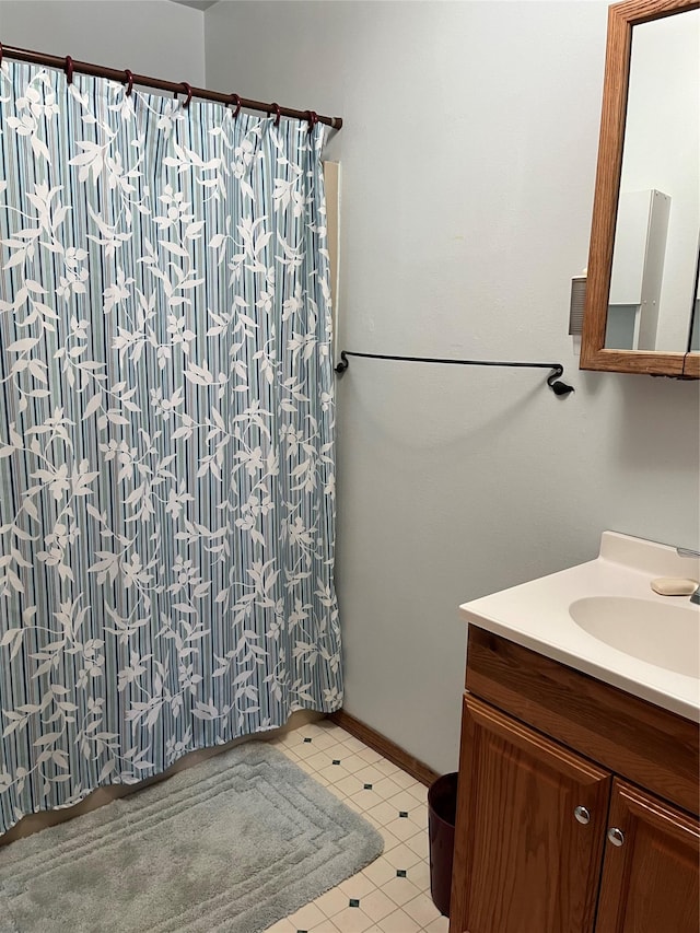 156 Clary Ave W, Geraldine, MT 59446 - bathroom with vanity and a shower with shower curtain