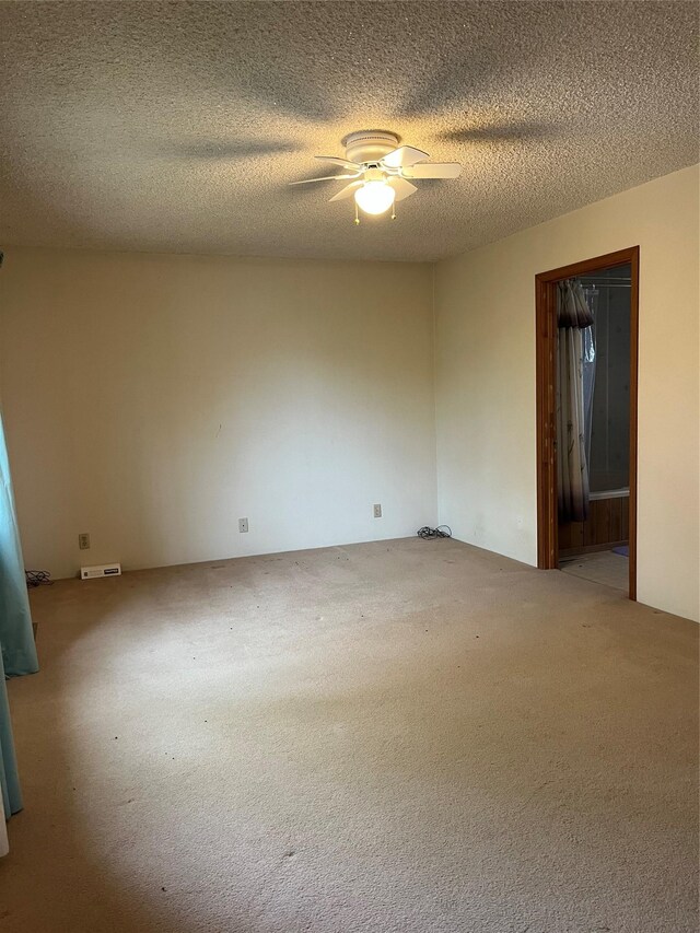 156 Clary Ave W, Geraldine, MT 59446 - carpeted empty room with ceiling fan and a textured ceiling