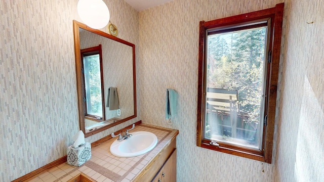 1487 Lion Mountain Dr, Whitefish, MT 59937 - bathroom with wallpapered walls and vanity