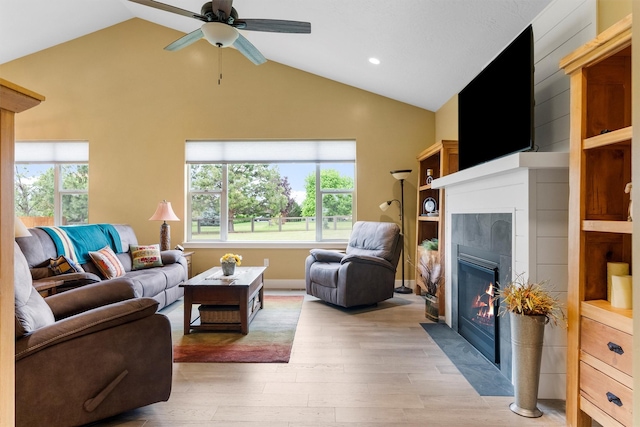 500 Bass Ln, Corvallis, MT 59828 - living area featuring ceiling fan, a fireplace, light wood-style floors, recessed lighting, and high vaulted ceiling