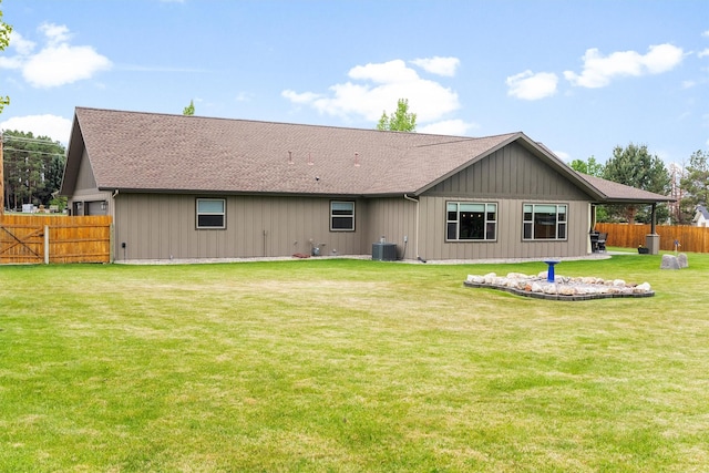 500 Bass Ln, Corvallis, MT 59828 - back of house featuring roof with shingles and cooling unit