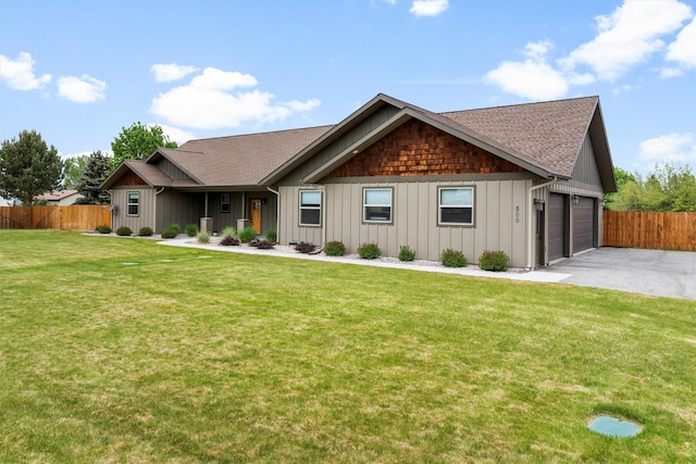 500 Bass Ln, Corvallis, MT 59828 - single story home with board and batten siding, roof with shingles, driveway, and a garage
