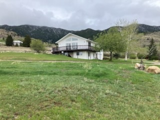 3946 E Ridge Rd, Butte, MT 59701 - view of grassy yard with a mountain view