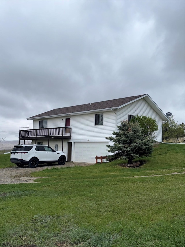3946 E Ridge Rd, Butte, MT 59701 - view of home's exterior with an attached garage, a yard, and a wooden deck