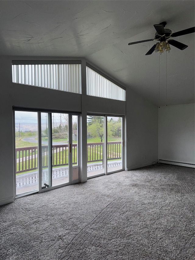 3946 E Ridge Rd, Butte, MT 59701 - unfurnished living room featuring carpet, high vaulted ceiling, and ceiling fan