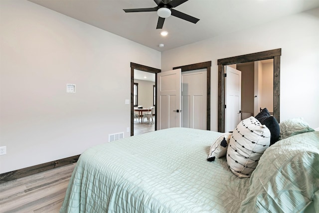 5576 Cattle Dr, Missoula, MT 59808 - bedroom with wood finished floors, recessed lighting, and ceiling fan