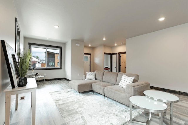 5576 Cattle Dr, Missoula, MT 59808 - living area with light wood finished floors, baseboards, and recessed lighting