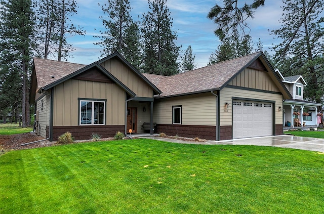 11613 Ninebark Way, Missoula, MT 59802 - view of front of home featuring an attached garage, roof with shingles, board and batten siding, driveway, and a front lawn
