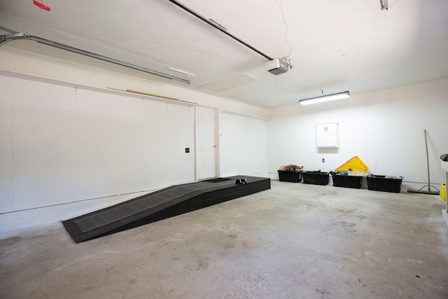 6400 Boondock Ln, Clinton, MT 59825 - garage featuring a garage door opener