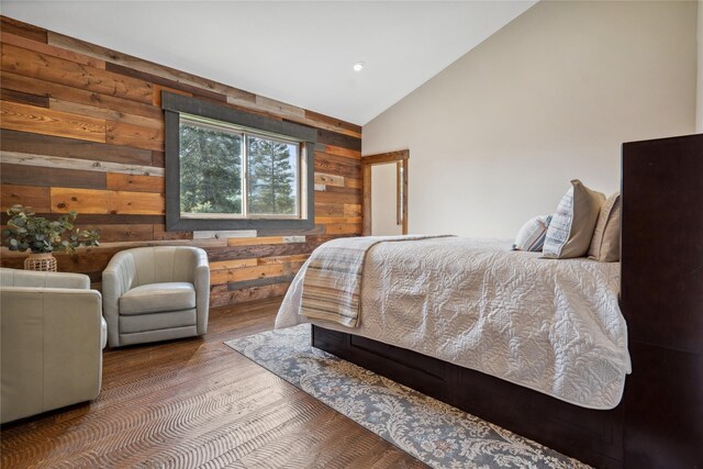 200 Lakeview Ter, Marion, MT 59925 - bedroom with wooden walls, vaulted ceiling, wood finished floors, and recessed lighting