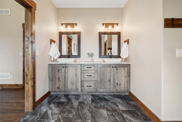 200 Lakeview Ter, Marion, MT 59925 - full bathroom with baseboards and double vanity