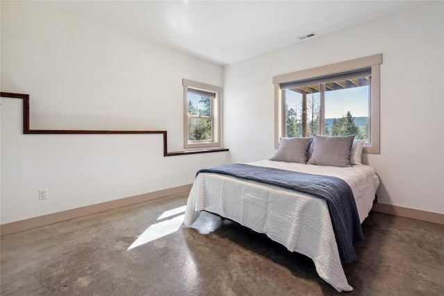 200 Lakeview Ter, Marion, MT 59925 - bedroom featuring baseboards and concrete flooring